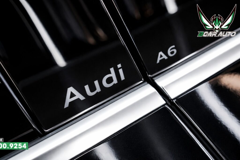 logo Audi A6 trên bề mặt 2 cửa sáng bóng sau khi dán PPF 